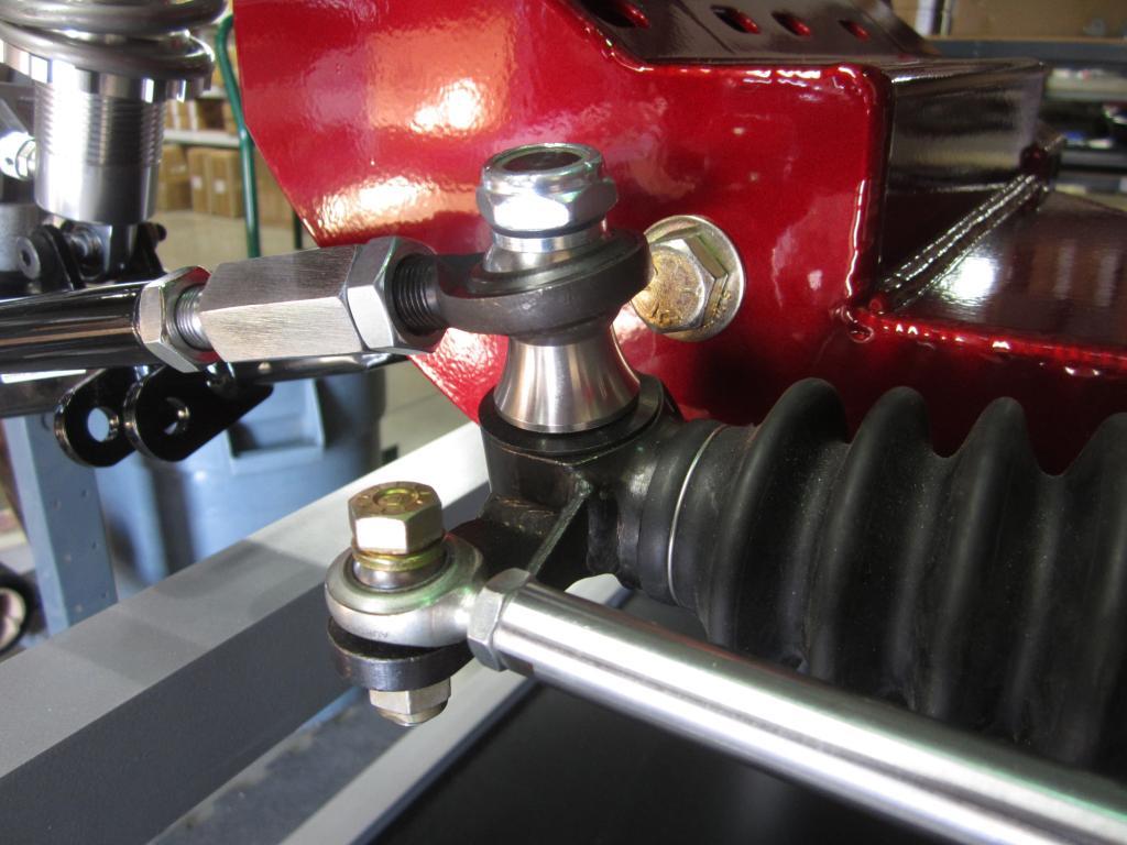 Install the.650" bushing on the rack pin under the heim joint, See below.