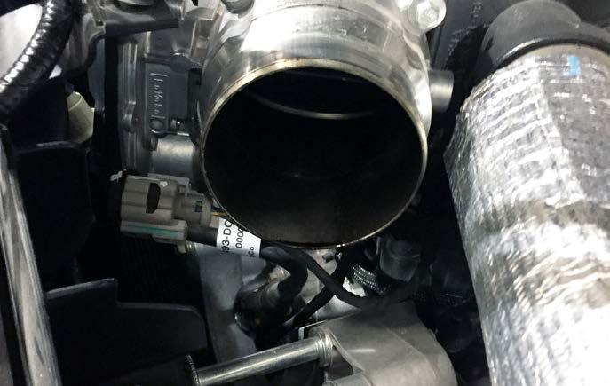 valve from the vehicle. Ensure that the factory gasket is retained as it will be re-used during reassembly.