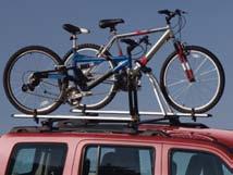 1 Racks & Carriers - Bicycle Carrier, Roof-Mount - Thule In partnership with Mopar, Thule, the leading US manufacturer of car rack systems, offers roof-mount bike carriers.
