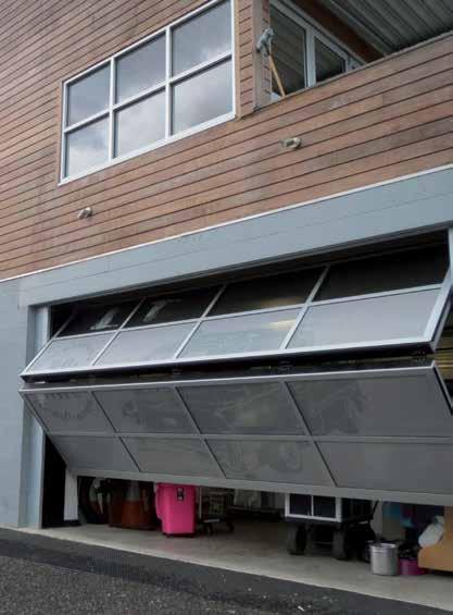 Operation The Glide-Away Folding Garage Door is balanced between the frame weight and the weights that are attached via four axle shafts over two pulley sheaves.