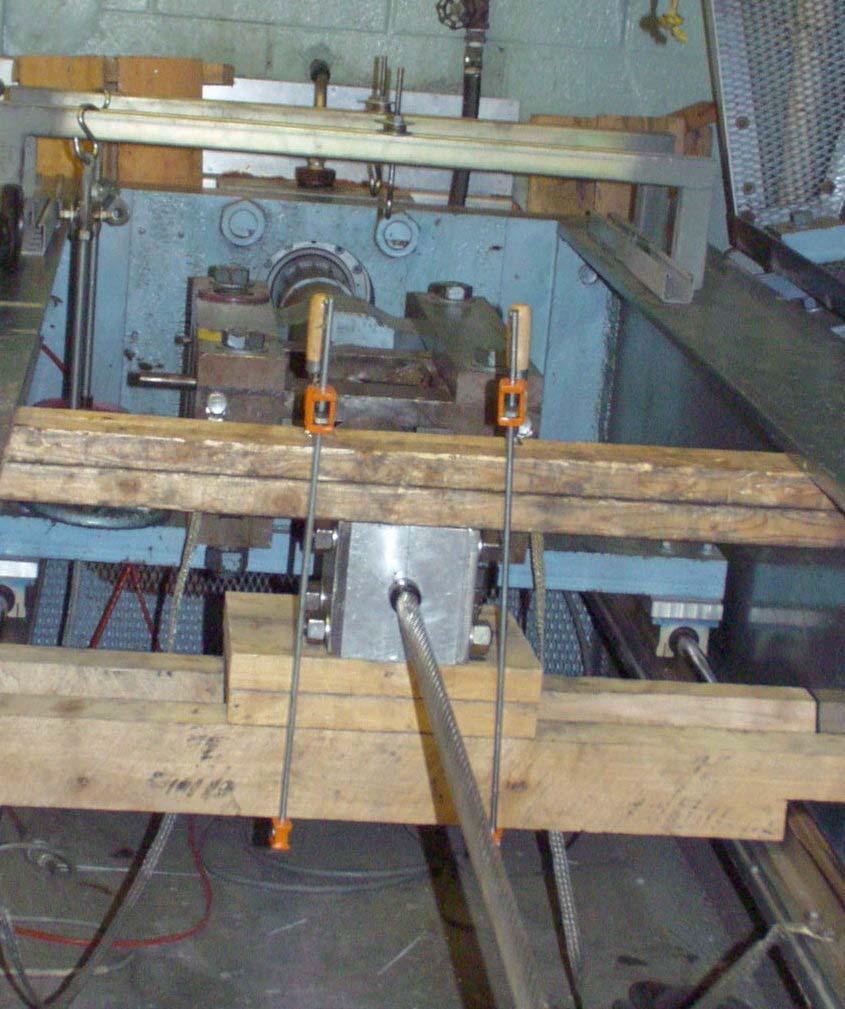Photograph 3, cribbing used to prevent sample rotation 477 ACCR: The plan was to determine turns to first break by rotating the swivel bearing +180 degrees (direction that tightens outer aluminum