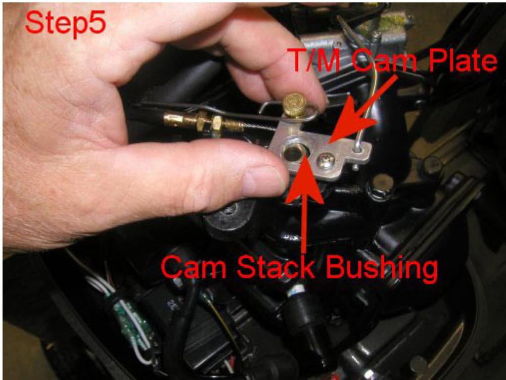 5. Place the TrollMaster cam plate over the raised portion of the cam stack bushing and replace the center bolt and washers.