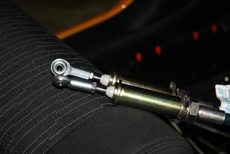 (This should look like the photos to the right.) 4. Using a mallet, hammer the pivot bushings into the shifter handles.