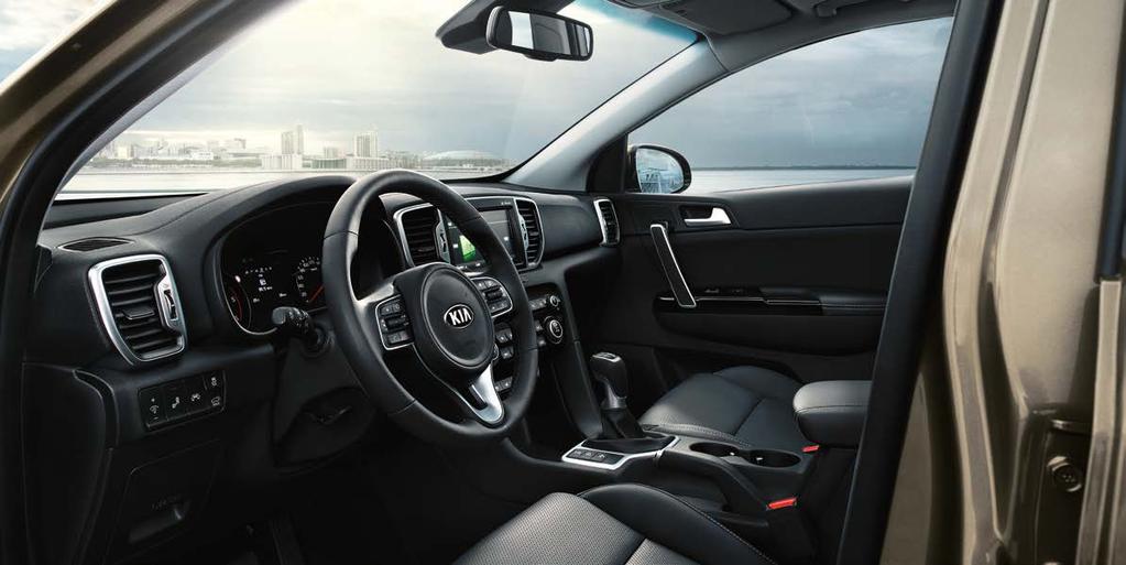 Interior design and quality You won t just see the difference. You ll feel it. 1 You ll want to be very hands-on in the Kia Sportage.