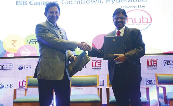 Exchanging of MoU document with Shri Suresh Challa, President, The Indus Entrepreneurs (TIE),