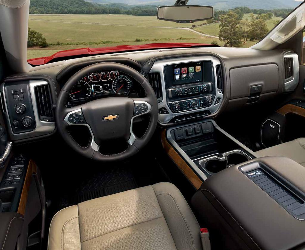 1500 Crew Cab LTZ interior in Dune with perforated leather appointments, Cocoa interior accents and available features. DESIGNED FOR ALL-DAY COMFORT.