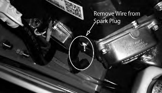 . Changing the spark plugs and checking the spark plug gap: ) Remove the wire on the spark plug and use a / socket to remove the spark plug. ) Check the gap on the spark plug to verify that it is 0.