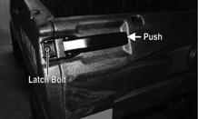 To open the tailgate, pull the latch handles (located on the end of the tailgate). 2.