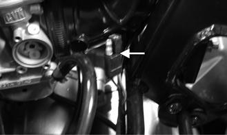 NOTE: The rear output terminal is located beneath the center console near the right-side of the throttle body.