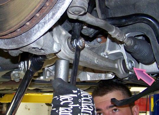 Reinstall Lower Front Strut Step 31 Slide the wishbone back over the lower control arm.