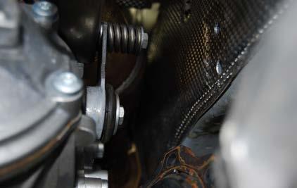 Swing the converter to the side to gain the necessary clearance to remove the transmission.