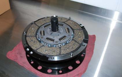 NOTE The clutch disc will only fit and sit flush on the flywheel one way.
