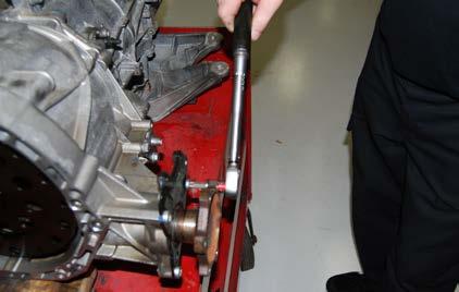 ASSEMBLING AND INSTALLING THE CLUTCH MODULE Step 13: Insert the axle back into the bell housing and through the