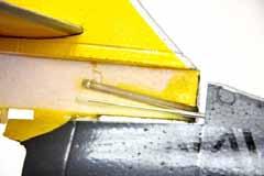 Carefully install the vertical stabilizer