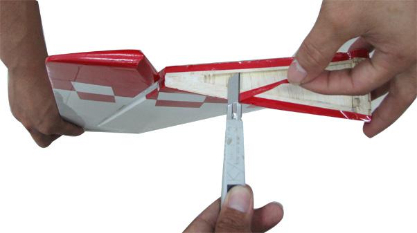 2) While holding the vertical stabilizer firmly in place, use a pen and draw a line on each side of the vertical stabilizer where it meets the top of the fuselage. Fill epoxy.