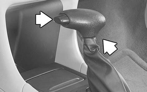 Console Shift Lever 1. Hold the brake pedal down with your right foot and set the parking brake. 2.