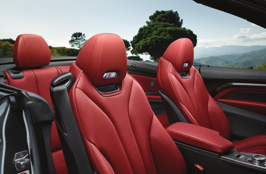 TOP DOWN. HEART RATE UP. The M4 Convertible interior has all the racecar-inspired features of its M siblings.
