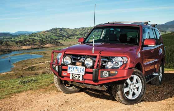 Mitsubishi Pajero shown with ARB Sahara bar, ARB roof rack, IPF driving lights, electric winch and