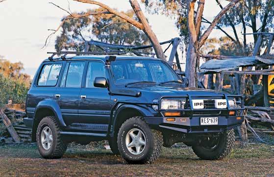 Toyota LandCruiser 80 Series shown with ARB deluxe bar, Safari snorkel, IPF lights and ARB side rails & steps. 2.