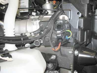 Wiring harness of heater Clip-type cable tie in existing hole Wiring harness of heater control and green/white (gn/ws) wire in 0