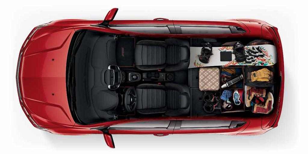 INTERIOR DESIGN 1. SMALL CAR. BIG SPACE. The wideopening liftgate offers easy access to the cargo space in Sonic Hatchback. 1 Sonic Sedan has 14.