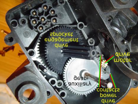 are removed, the drive engagement sprocket and motor drive with