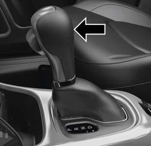 If the gear selector cannot be moved to the PARK, REVERSE, or NEUTRAL position (when pushed forward) it is probably in the AutoStick (+/-) position (beside the DRIVE position).