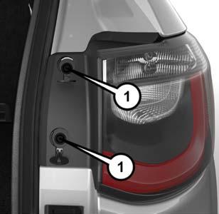 IN CASE OF EMERGENCY 5. To replace the DRL bulb gently push bulb towards housing. Be sure to hear both the top and bottom locking tabs CLICK to ensure the bulb is properly seated. 6.