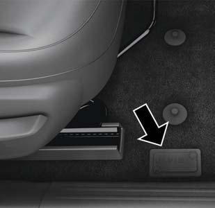 With the passenger seat in the rear most position, a door in the carpet can be opened to reveal the VIN.