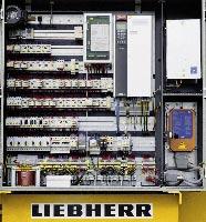The switchgear cabinet. The hoisting and erecting winches. The EDC slewing gear. The trolley travel gear. Powerful Liebherr drives. All drives and the switchgear cabinet are manufactured by Liebherr.