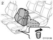 CY13135 CY13136 1. Remove the head restraint. Move the seat position adjusting switch forward to slide the seat further forward than the front most position. 2.