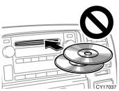 YOUR COMPACT DISC PLAYER (type 1) When you insert a disc, gently push it in with the label side up. The compact disc player will play from track 1 through to the end of the disc.