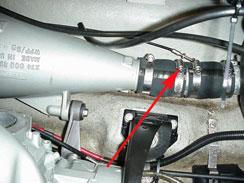 Remove the four bolts securing the cover. Remove it and the rotary valve below. 2.