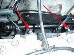 5.4 (Below) Remove the two 10mm bolts securing the fuel rail to the cylinders.