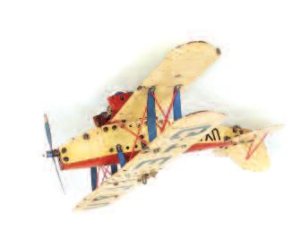 length and 54cm wingspan, with operable motor and integral key present, finished in silver with RAF roundels to wings, detailed in shades of red and blue, missing the battery operated central light,