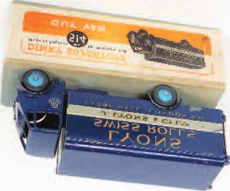 all card orange and white labelled box, surfaces chips to model (G-VG-BVG) 150-200 1904 Dinky Toys, 514 Lyons Guy van, dark blue first type cab, chassis and back, mid-blue rigid hubs, Lyons Swiss