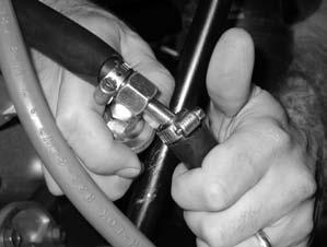 Sealant tape may be used on this sender as the gauge provides ground through the harness. b. Tighten the sender into the fitting with appropriate wrenches. c.