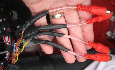 Take the RCA lead and twist the wires onto the signal and ground wires.