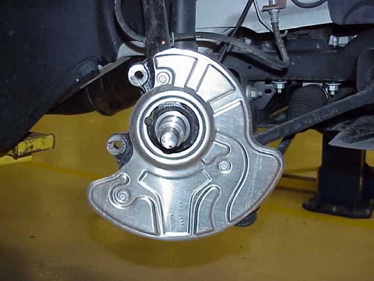 Safety Recall J27 Front Wheel Hub Nuts Page 6 Service Procedure (Continued) B. Replace Front Wheel Hub and Related Components: 1. Lower the vehicle from the hoist.