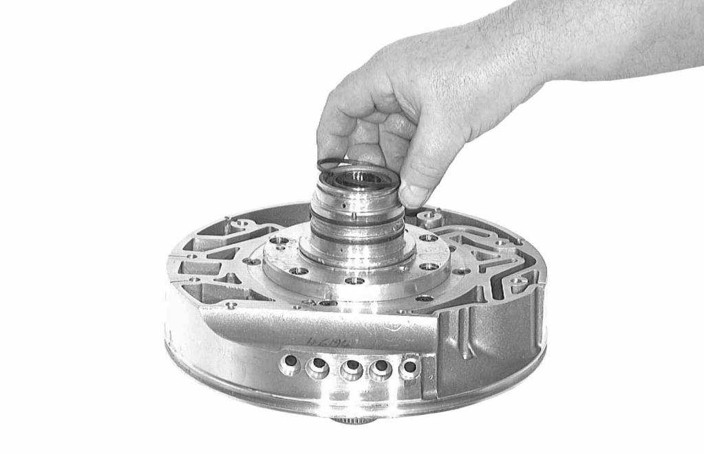 Pull O-ring seal off intermediate plate and 3 rectangular-section rings off the stator hub. 99