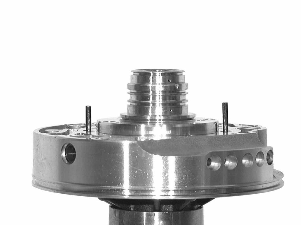 Secure the stator shaft loosely to the intermediate plate with 5 countersunk screws 10.060/130. 99210 Note: Check that the piston of the flow regulating valve can move freely.