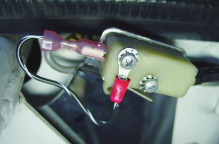 The wiring change to the limit switches allows separation of motor control and headlight operation
