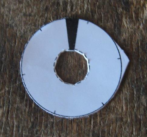 Tab Use a sharp craft knife to cut out one of the balance wheel stickers from the sheet (the sheet includes 2 spares).