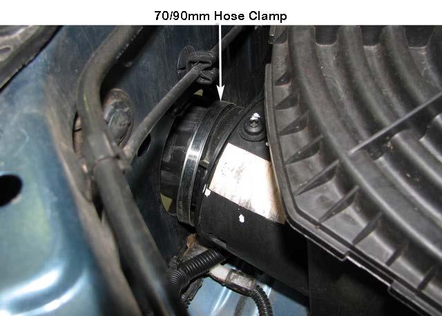 13 Loosely install a 70/90mm hose clamp (Item 11) over the air cleaner inlet adaptor, install the air cleaner base into the vehicle and fasten with standard
