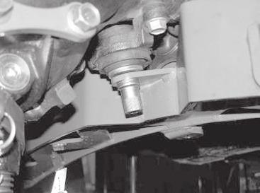 Re-install the factory rear differential nut at this time. SEE FIGURE 29 FIGURE 26 FIGURE 29 20.
