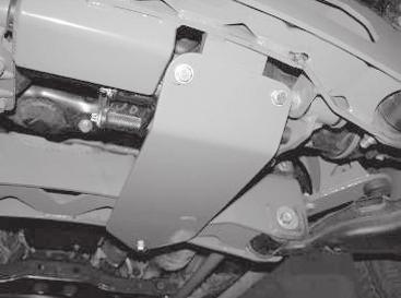 24. Locate FT70058BK skid plate. Attach using the supplied hardware (front mount) 5/16 x 1-¼ bolts, nuts, and washers (rear mount) ½ x 1-½ bolt, nut, and washer. (BAG 1) Leave loose.