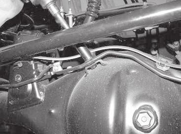 mount at the top of the differential housing, and the frame on the driver s side.