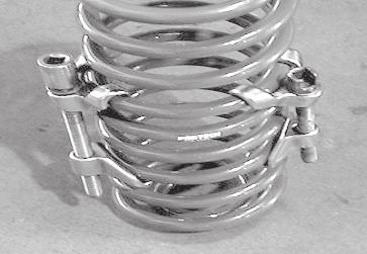 FIGURE 71 FIGURE 74 FT70096 NUT TAB FIGURE 72 COIL SPRING MUST BE