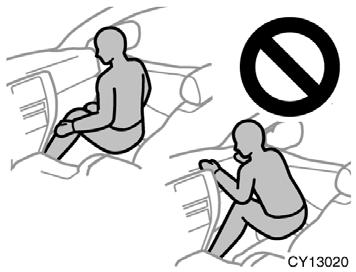 Do not sit on the edge of the seat or lean against the dashboard when the vehicle is in use, since the front passenger airbag could inflate with considerable speed and force.