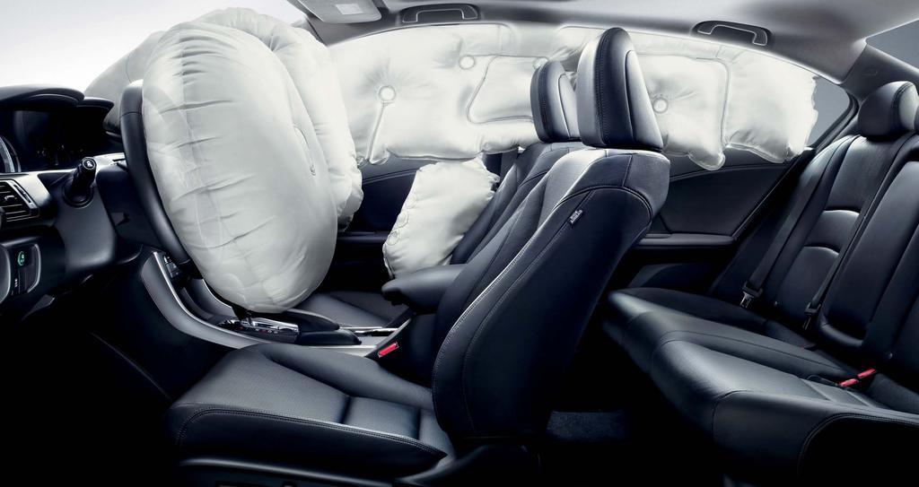 Accord EX-L V-6 Sedan shown with Black Leather and available Honda Satellite-Linked Navigation System. 2 Airbags inflated for display purposes.